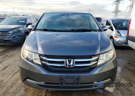 2016 Honda Odyssey Exl z USA, uszkodzony, nr VIN 5FNRL5H61GB093529